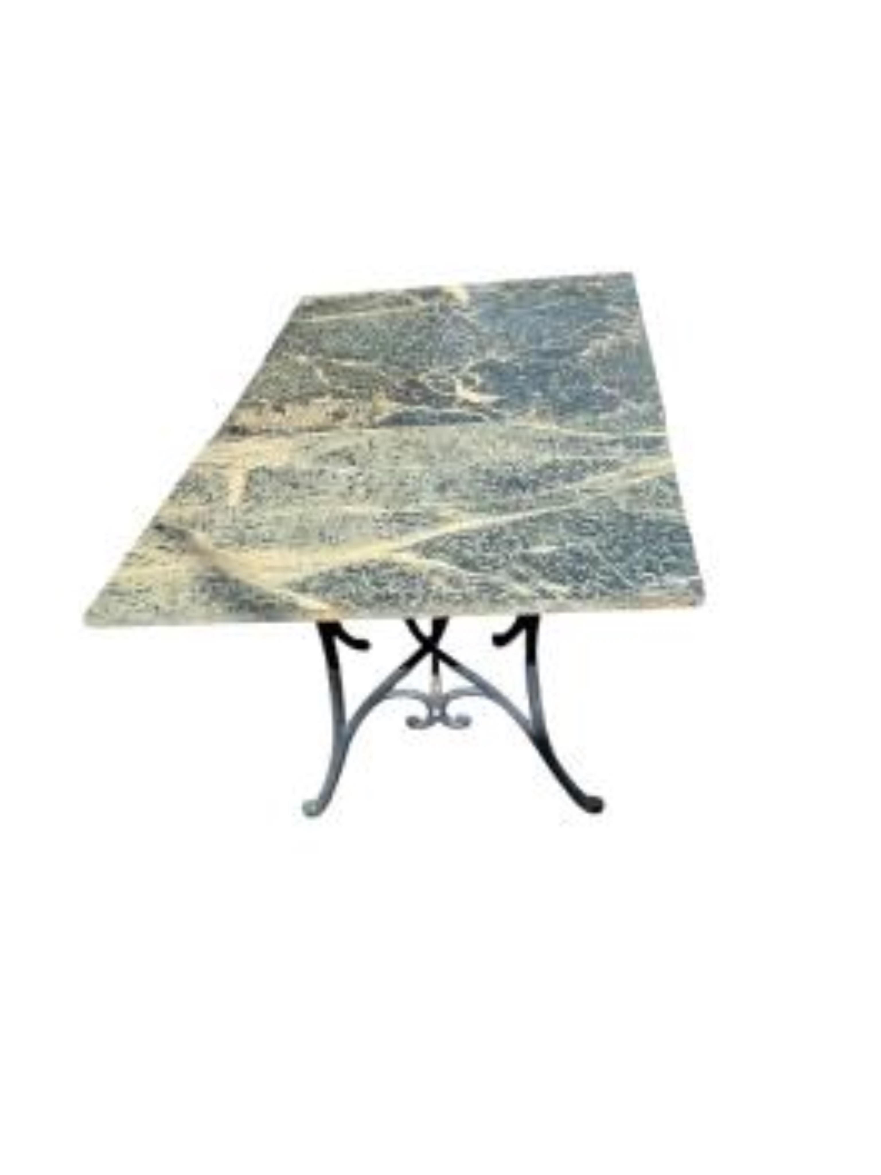 A marble top rectangular garden table, top in two sections, with 160cm, depth 94cm, height 67cm